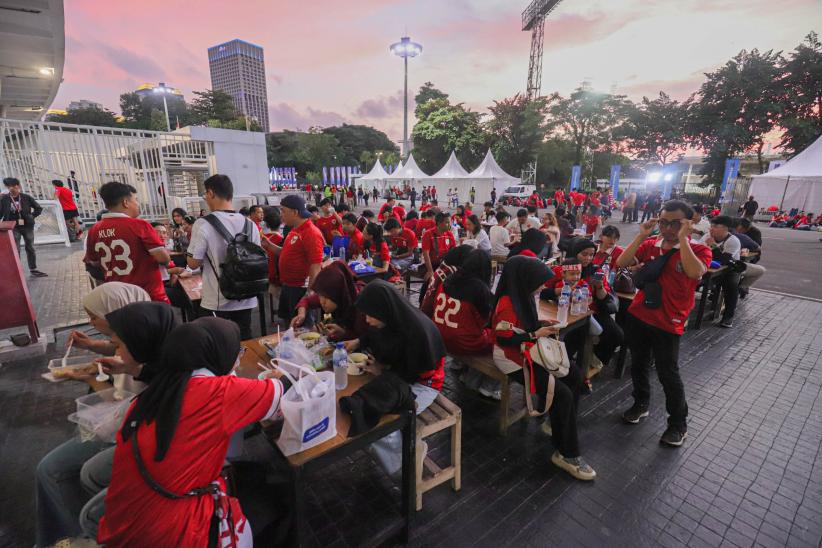 Suporter Timnas Indonesia Berdatangan ke SUGBK Siap Dukung Garuda Hadapi Bahrain - Bagian 4