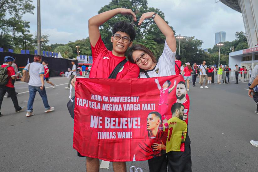 Suporter Timnas Indonesia Berdatangan ke SUGBK Siap Dukung Garuda Hadapi Bahrain - Bagian 6