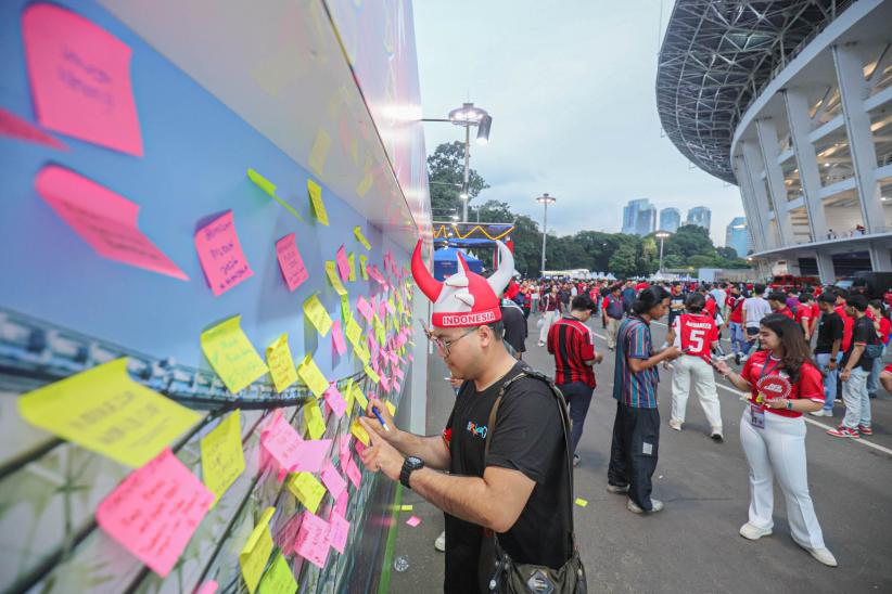 Suporter Timnas Indonesia Berdatangan ke SUGBK Siap Dukung Garuda Hadapi Bahrain - Bagian 2