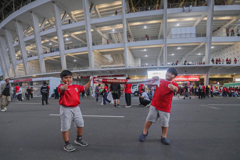 Suporter Timnas Indonesia Berdatangan ke SUGBK Siap Dukung Garuda Hadapi Bahrain - Bagian 3
