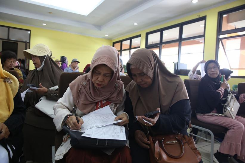 Para Lansia Ramai-Ramai Urus KLG untuk Dapat Fasilitas Transportasi Umum Gratis - Bagian 3