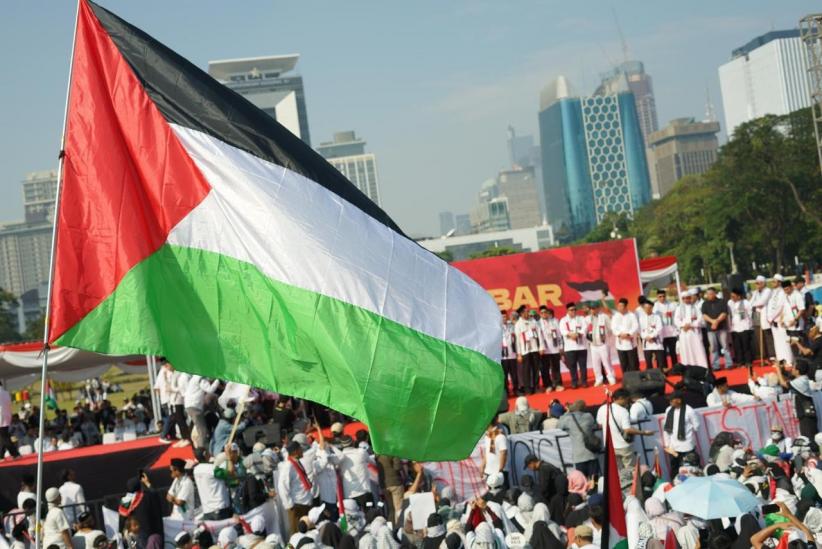 Ribuan Massa Hadiri Aksi Bela Palestina di Monas - Bagian 4