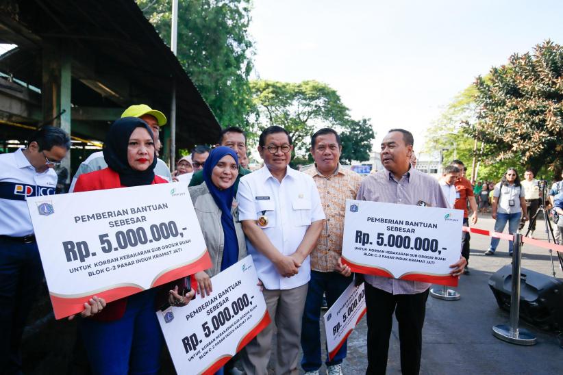 Pemprov DKI Berikan Santunan Rp5 Juta kepada Pedagang Pasar Induk Kramat Jati - Bagian 1