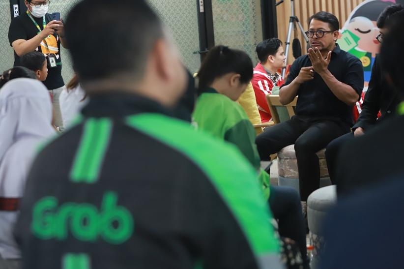 Ribuan Anak Mitra Pengemudi Ojol Terima Beasiswa - Bagian 4