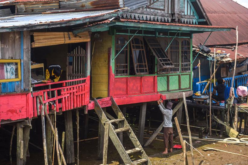 Aksi Sosial Mewarnai Puluhan Rumah Pinggiran Sungai Musi - Bagian 2