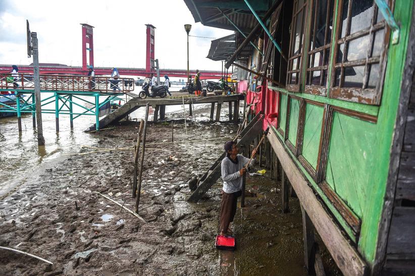 Aksi Sosial Mewarnai Puluhan Rumah Pinggiran Sungai Musi - Bagian 1