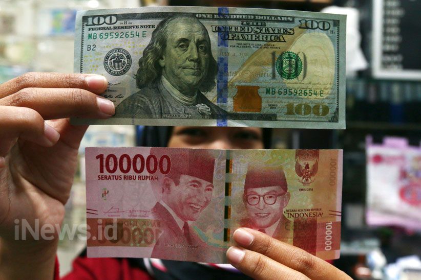 Terburuk Sejak 2016, Nilai Tukar Dolar terhadap Rupiah Nyaris 14.000 - Bagian 1