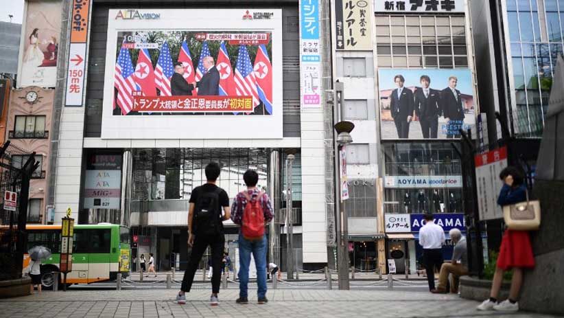 Foto-Foto Bersejarah Pertemuan Donald Trump dan Kim Jong Un di Singapura - Bagian 8