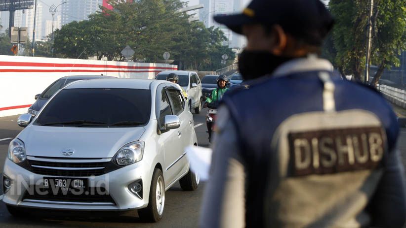 Perluasan Kebijakan Ganjil Genap di Jakarta Mulai Diuji Coba - Bagian 6