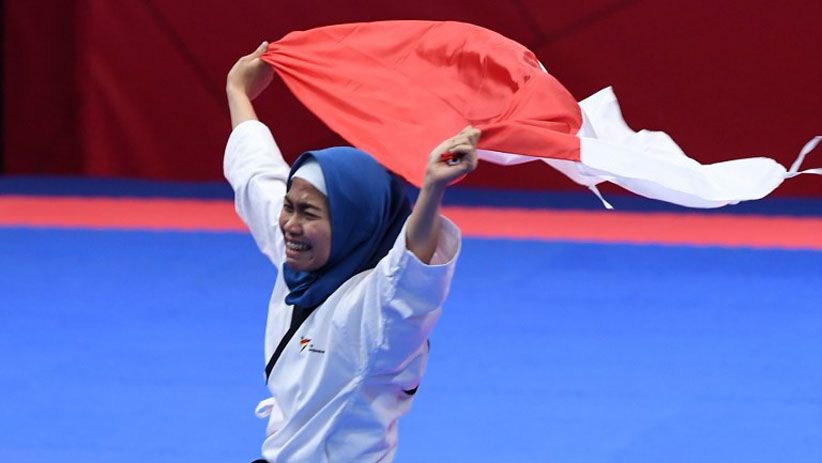 Senyum Taekwondoin Defia Rosmaniar, Sumbang Emas Pertama untuk Indonesia - Bagian 2