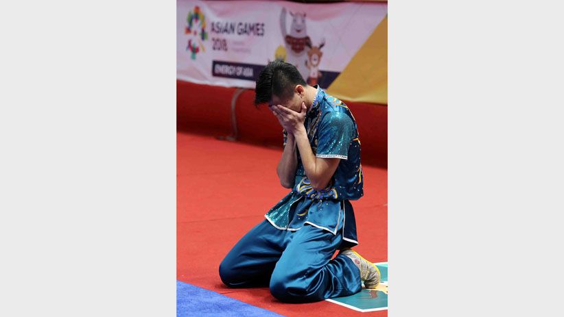 Aksi Marvelo, Atlet Wushu Penyumbang Medali Pertama untuk Indonesia - Bagian 4