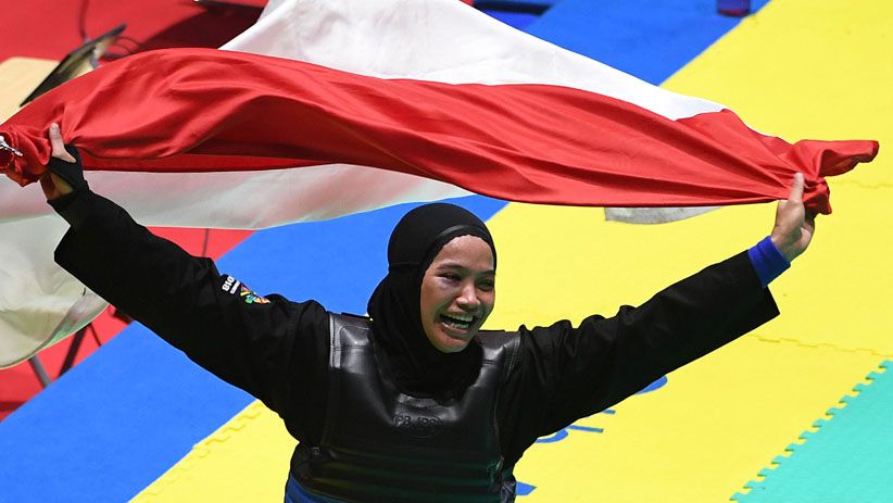 Wajah Lebam Pesilat Indonesia Sarah Tria Monita demi Medali Emas - Bagian 3