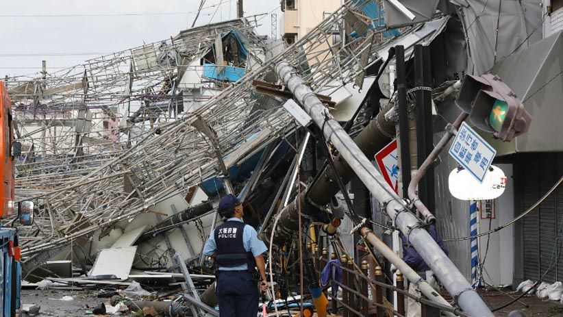 Jepang Dihantam Angin Topan Terkuat, Ribuan Kendaraan Rusak Parah - Bagian 5
