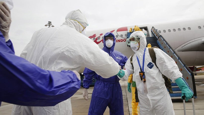 Foto-Foto 238 WNI Disemprot Cairan Disinfektan saat Tiba dari Wuhan China - Bagian 4