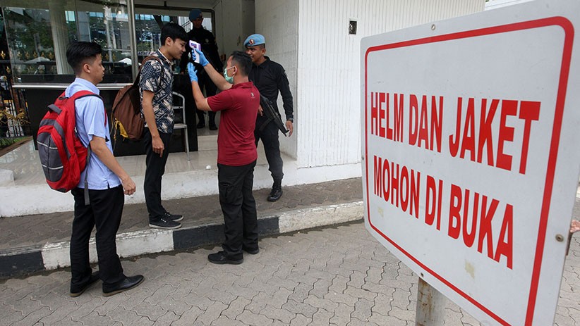 Cegah Virus Korona, Suhu Tubuh Para Menteri Diperiksa sebelum Masuk Istana - Bagian 4