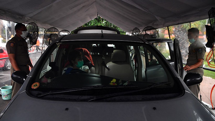 Penampakan Bilik Penyemprotan Disinfektan untuk Kendaraan Bermotor di Surabaya - Bagian 2