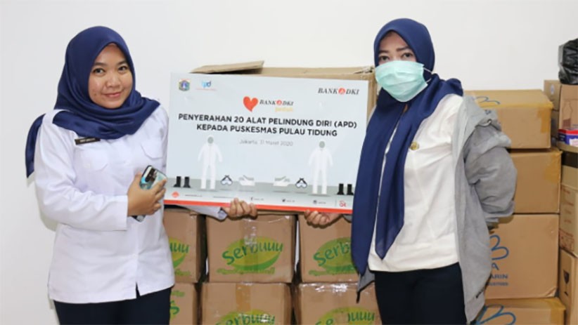 Bantu Penanganan COVID-19, Bank DKI Serahkan APD ke Puskesmas Pulau Tidung - Bagian 1