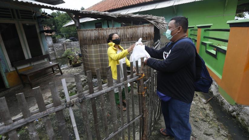 BNI dan Jamkrindo Salurkan Sembako untuk Warga Terdampak Pandemi di Serang - Bagian 6