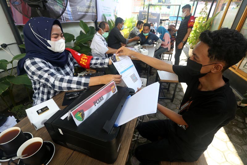 Polda Aceh Gelar Vaksinasi COVID-19 dari Warkop ke Warkop - Bagian 2