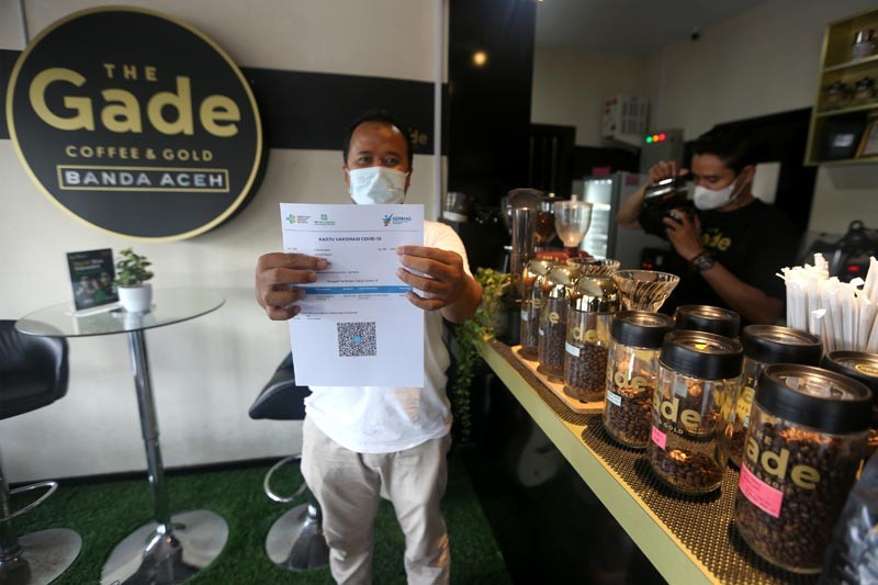 Polda Aceh Gelar Vaksinasi COVID-19 dari Warkop ke Warkop - Bagian 3